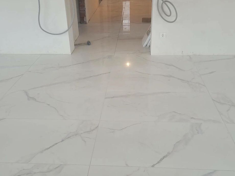 Укладка керамогранита на пол в Янино 3