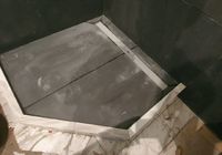 Укладка крупноформатного керамогранита в санузле на  ул. Полозова  1