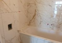 Укладка крупноформатного керамогранита в санузле на  ул. Полозова 2