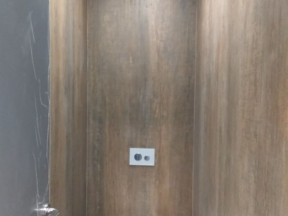 Укладка крупноформатного керамогранита в санузле на ул. Марата 1