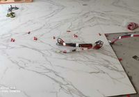 Укладка крупноформатного керамогранита на пол на наб. Мартынова 1